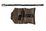 Open Sojourner tool roll in saddle brown canvas with black leather trim, showing tire levers and a spare tube in the pockets